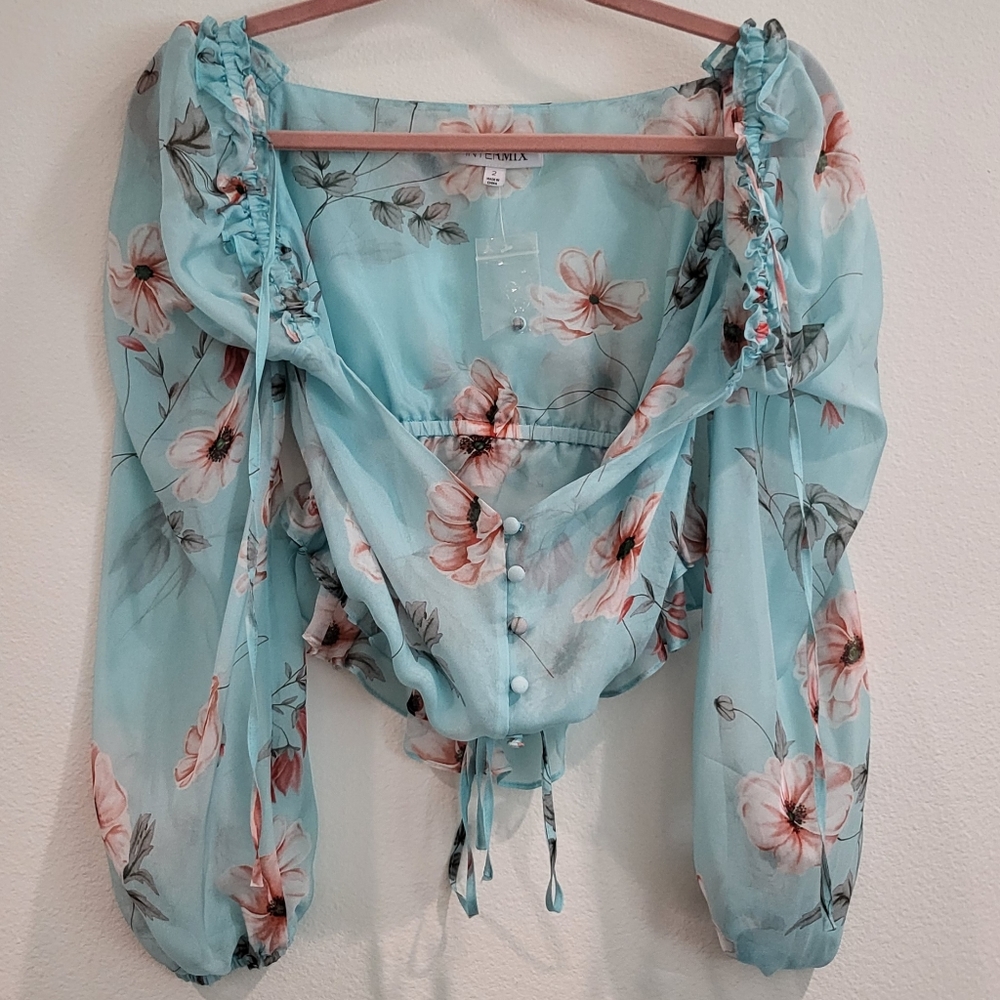 Brand new Intermix top in size two, made of 100% silk floral crop top